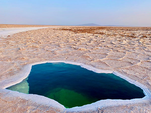 Salt water pool in the middle of the Ethiopian desert Afar region